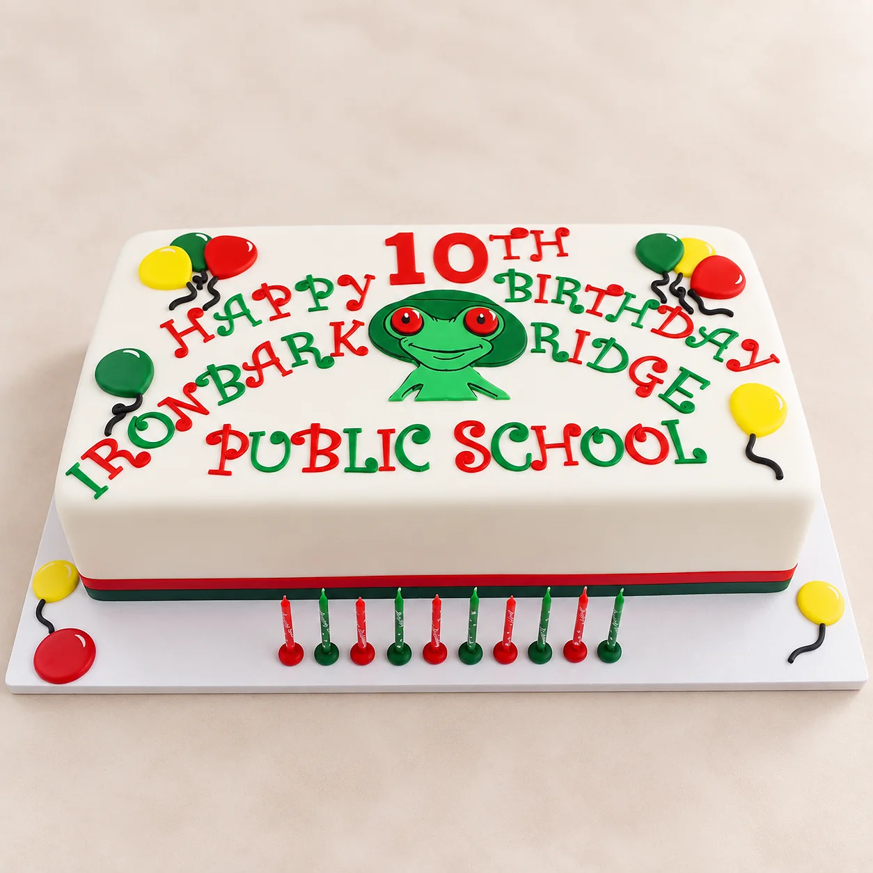 School celebration cake with school branding