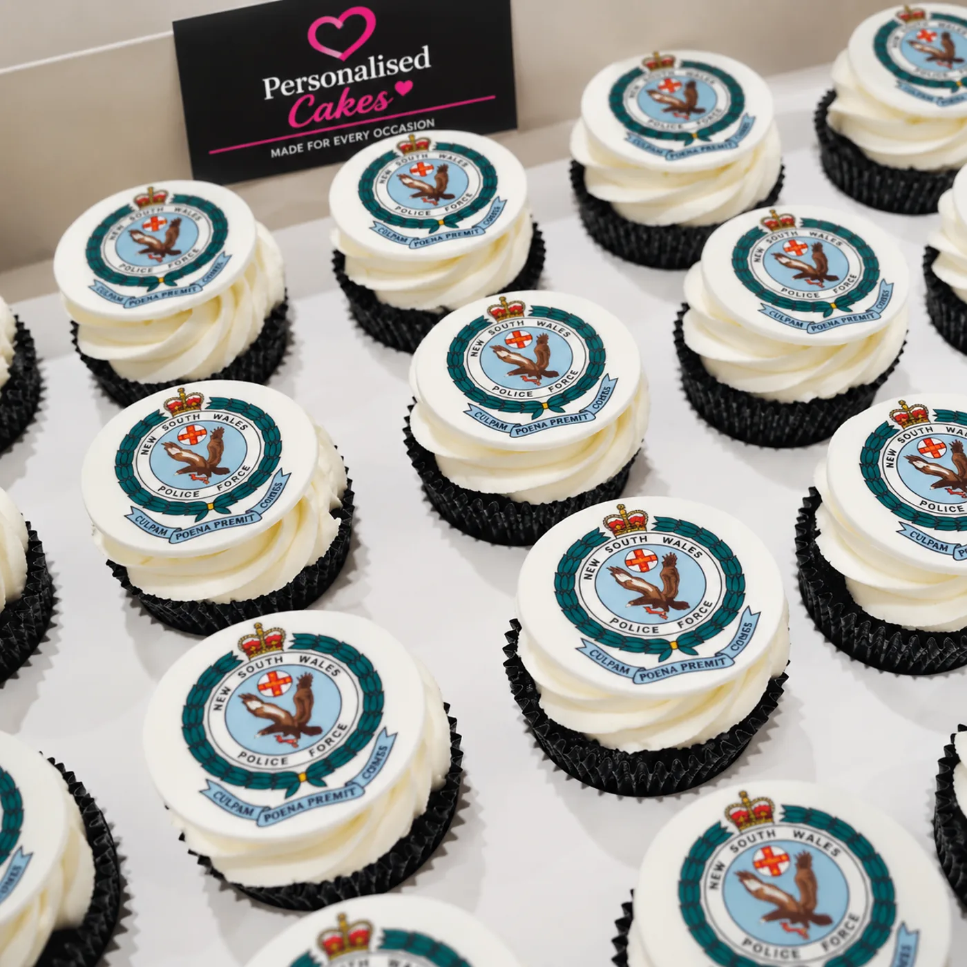 New South Wales Police Force branded cupcakes in a presentation box