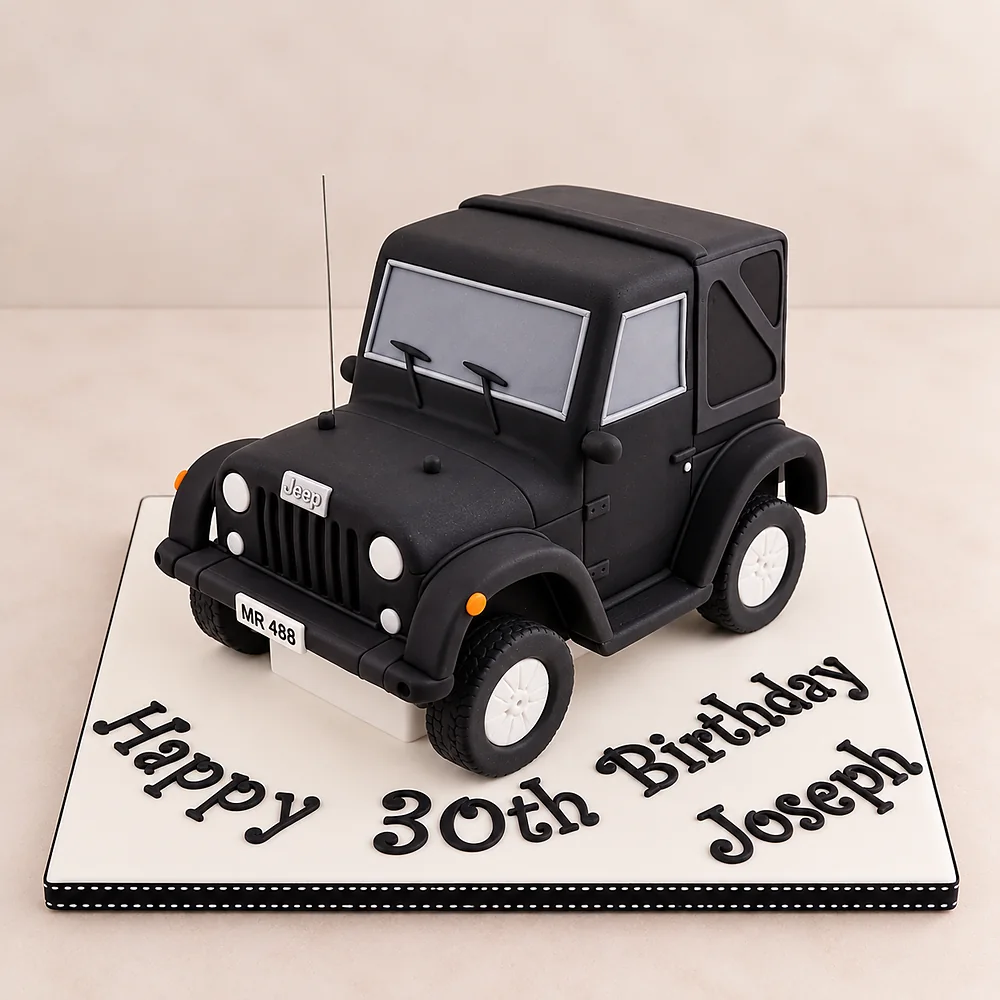Black Jeep shaped birthday cake
